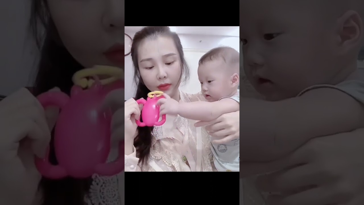 Single mother breastfeeding. A Peaceful Day of a Young Single Mom with Her Baby