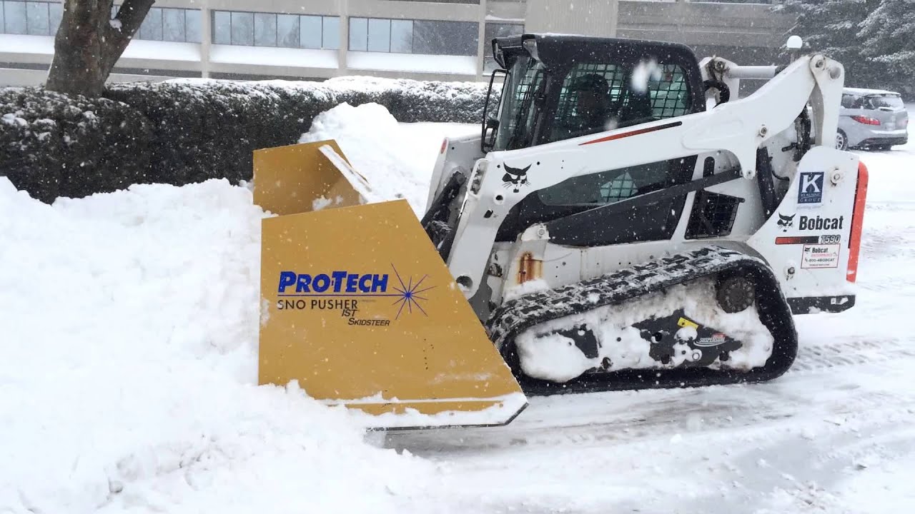 Skid Steer with Snow Pusher 1 - 14