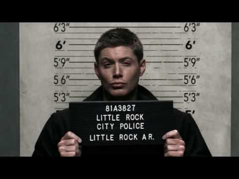 Supernatural funny scene with Sam and Dean having mug shots taken