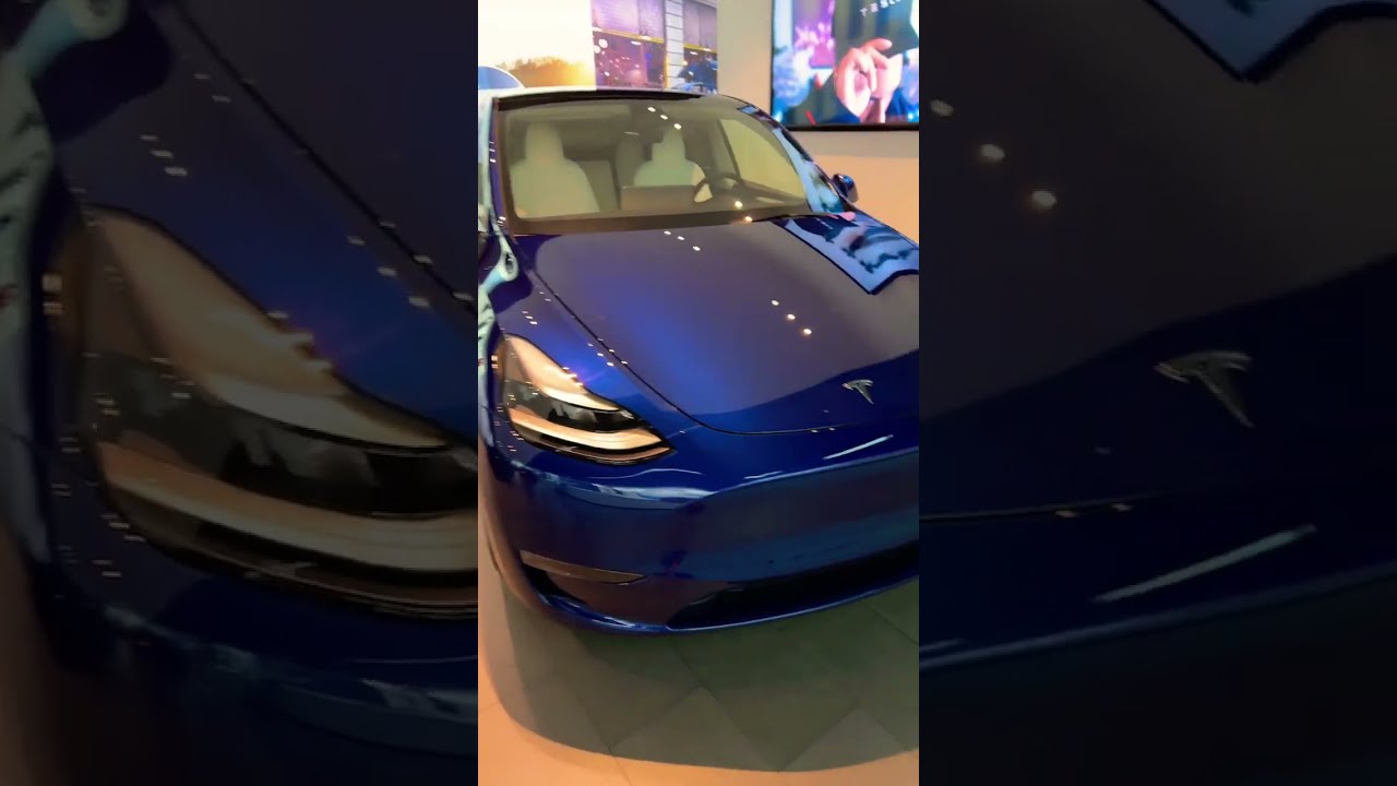Tesla Model Y Deep Blue Metallic with White Interior