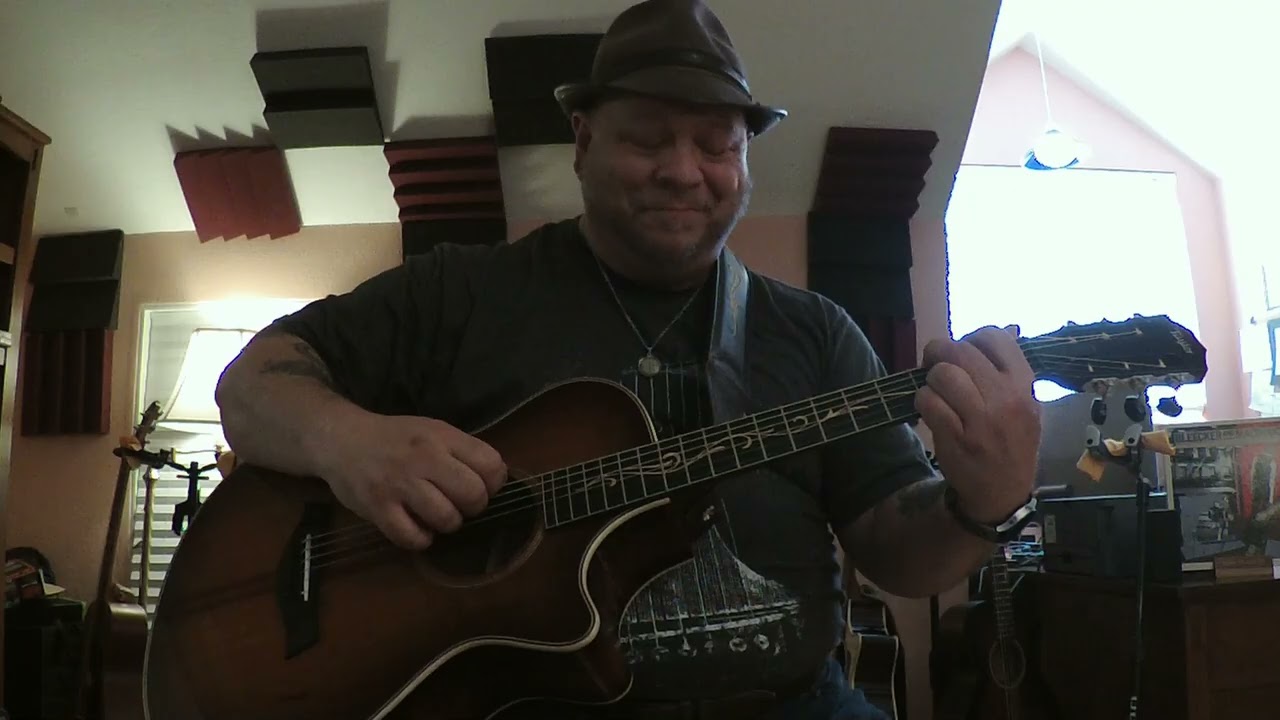 The Taylor K22ce 12-fret acoustic guitar. An Honest Opinion and Play Through from a Regular Guy.