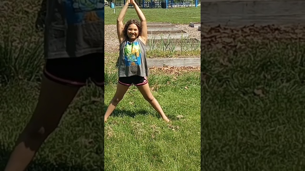 tickling Ella daughter yoga meditation community garden class good energy