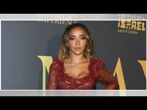 Tinashe Builds Sandcastles At The Beach In A Skimpy Pink Bikini