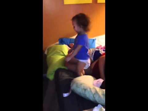 Toddler breaks neck jumping into bed.