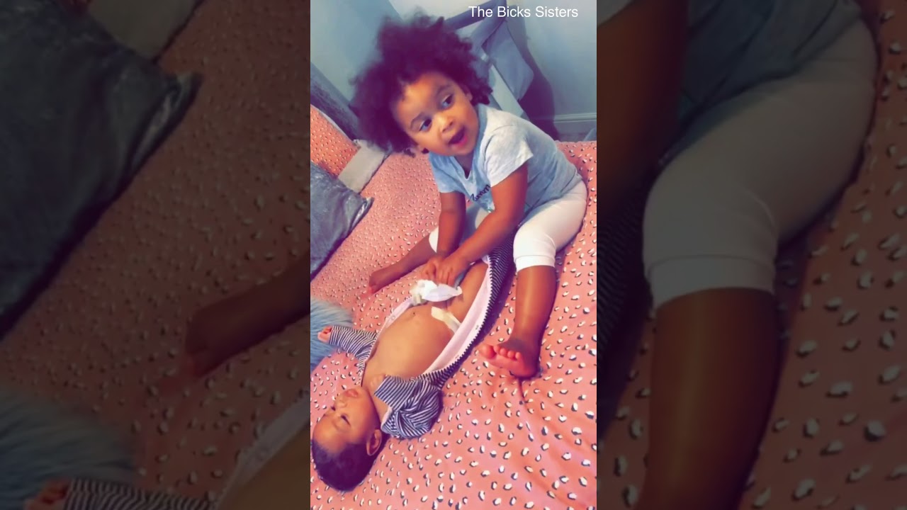 Toddler Changes her little sisters Nappy | Hillarious | Smelly Diaper