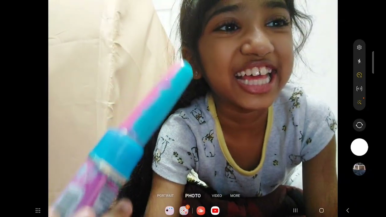 trying a cotton candy flavored push pop