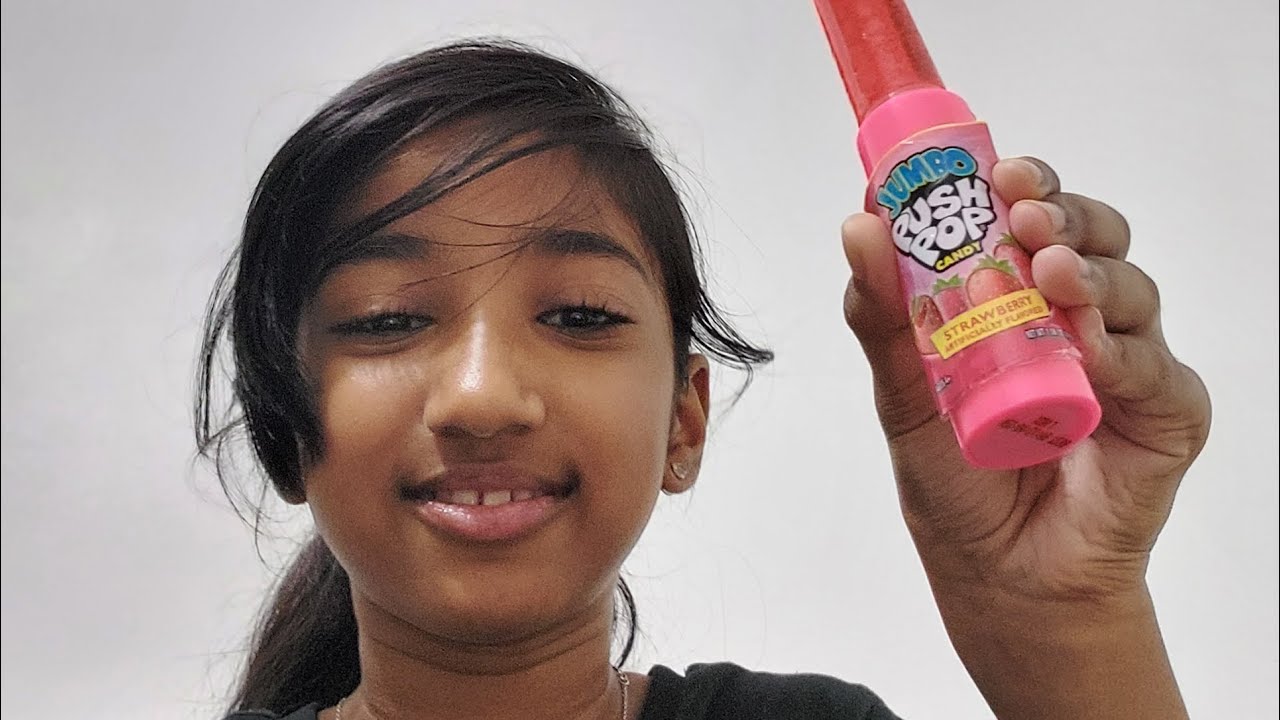 TRYING A STARBERRY FLAVORED JUMBO PUSH POP FOR THE FIRST TIME!!