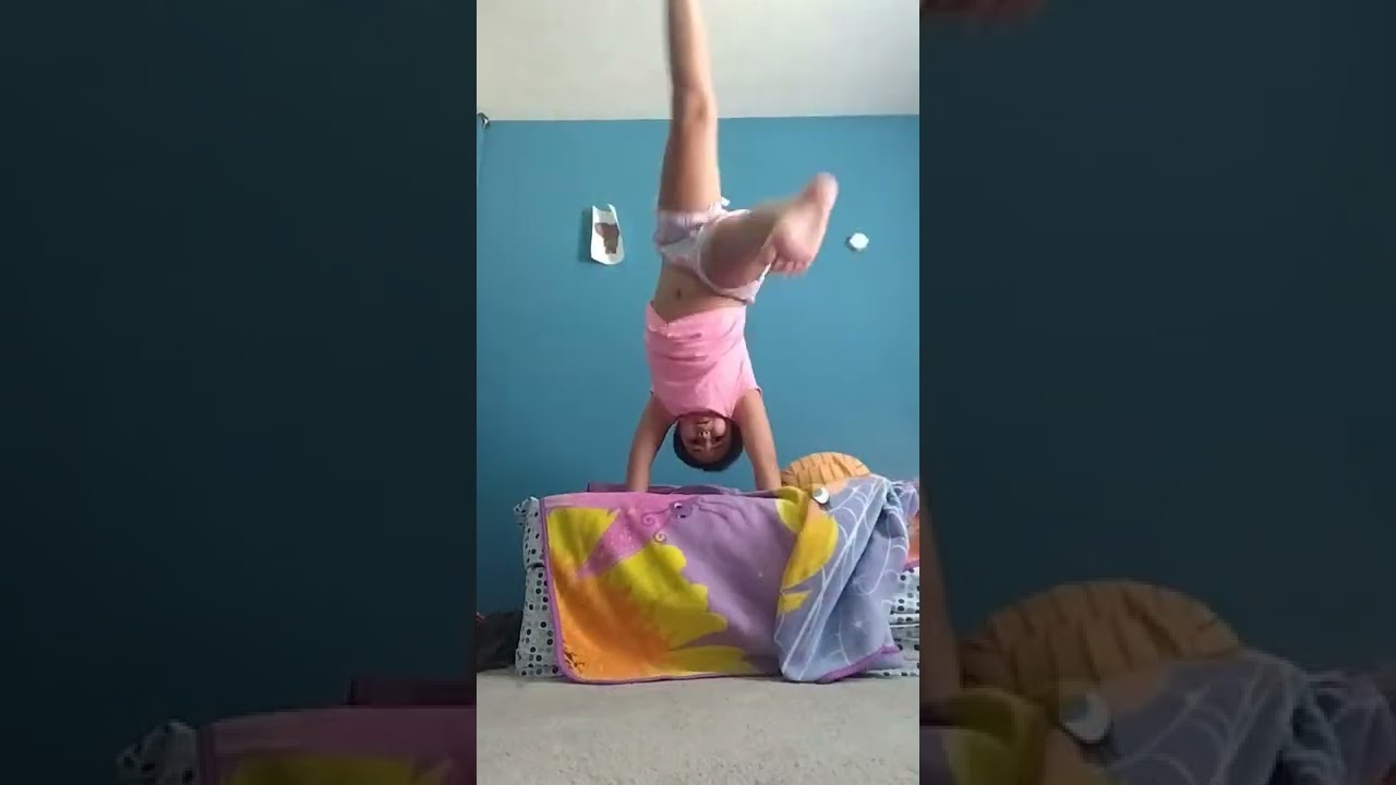 trying to do a handstand on my bed🤣