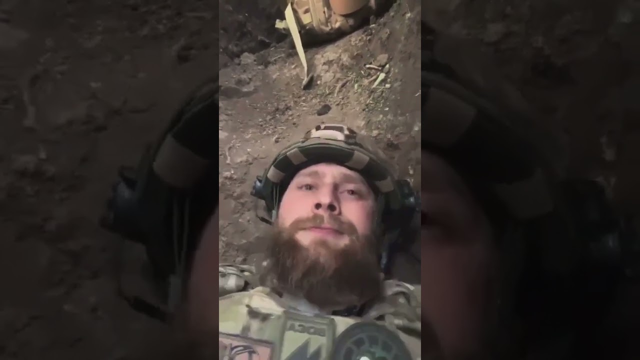 Ukrainian soldier films the moment a Russian munition hits his position.