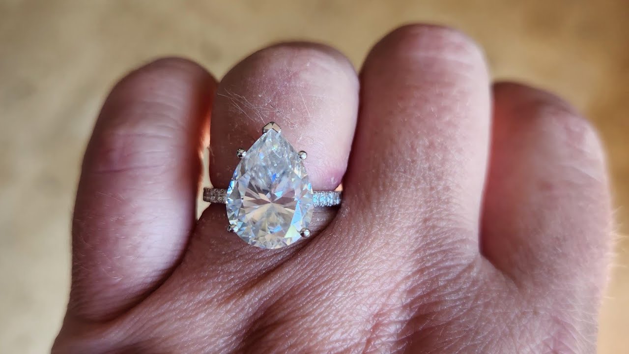 Unboxing video on Elysian Jewels! 7 carat colorless crushed ice pear cut moissanite ring for $232!