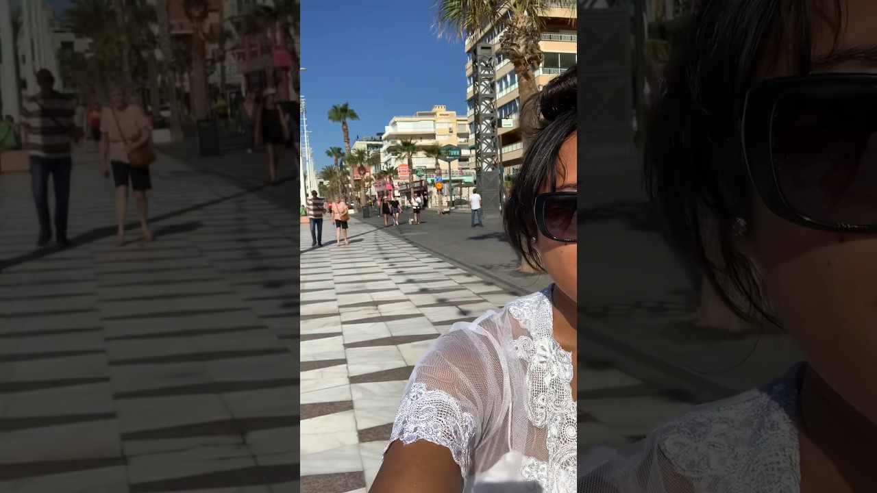 Walking at Benidorm beach with Traditional Kebaya Indonesia