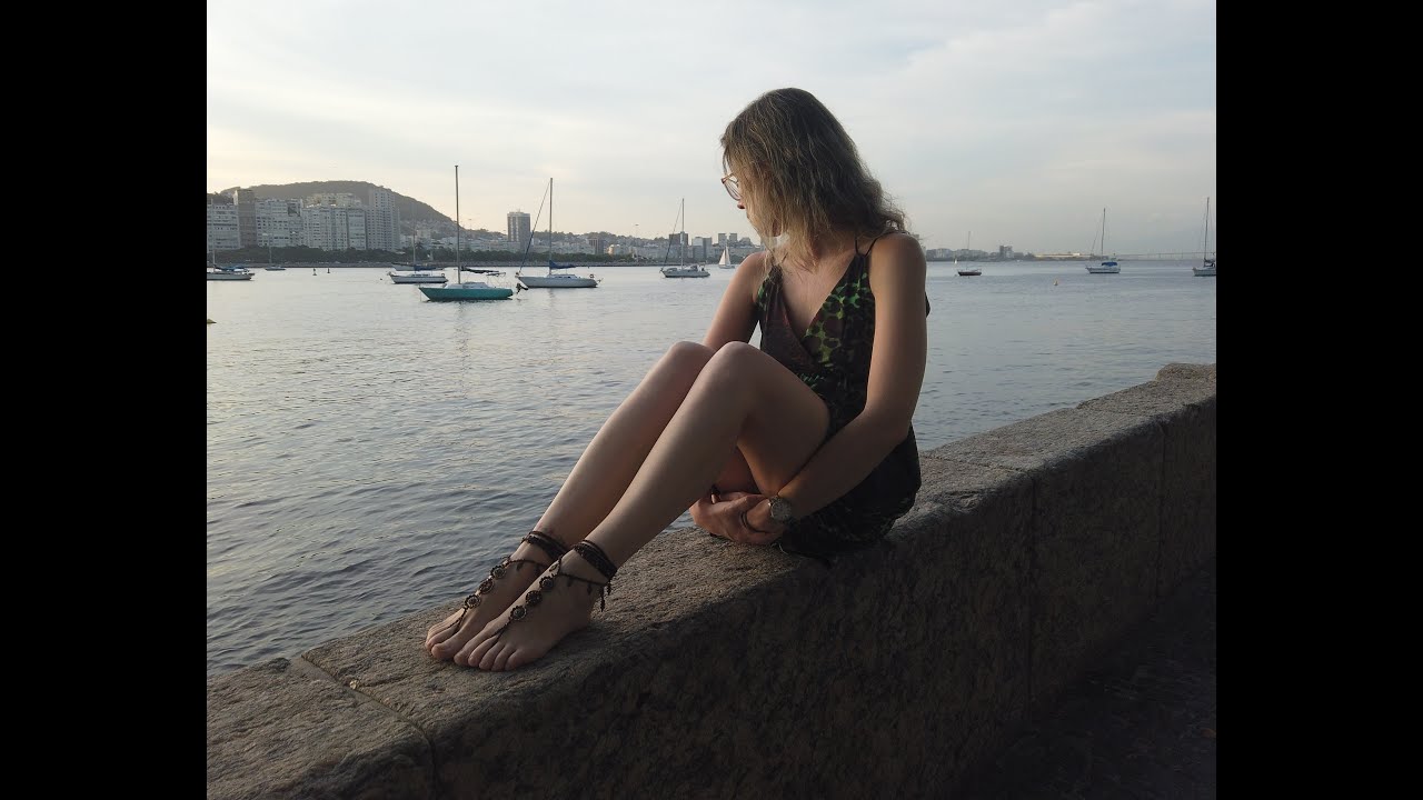 Walking with barefoot sandals in the city streets