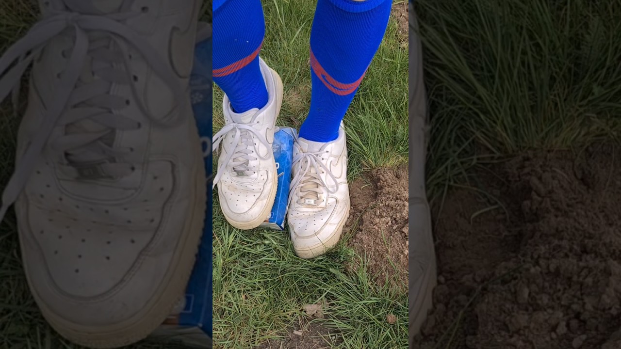 White Nike Air Force 1 low sneaker and soccer socks stomping burst tetra pack squirts