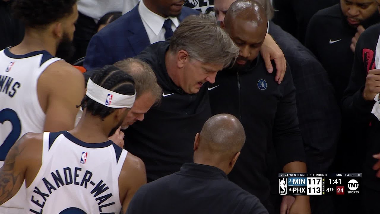 Wolves Coach Chris Finch had to be helped to the locker room after collision with Mike Conley