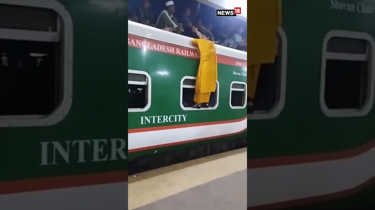 Woman Attempts To Climb The Roof Of A Crowded Train, Fails Miserably | #viral | #viralvideo