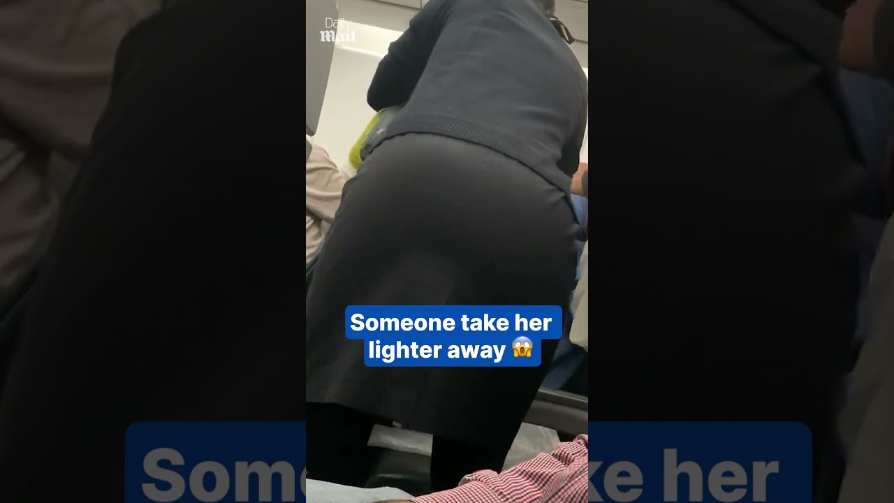 Woman detained by passengers after smoking on a plane