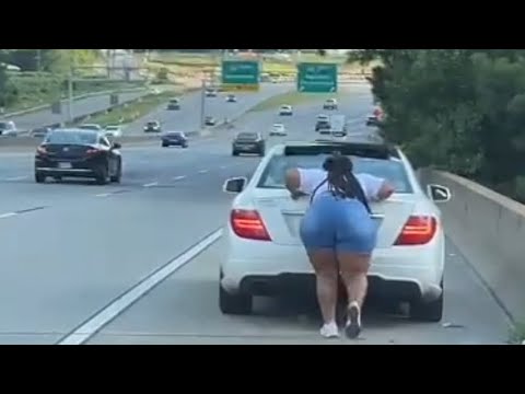 Woman pushed car on highway while her boyfriend sit in the car 😳 #wow #crazy #bmw #mercedes