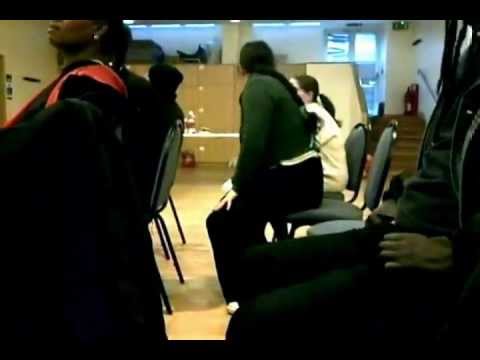 Woman scratches and sniffs herself