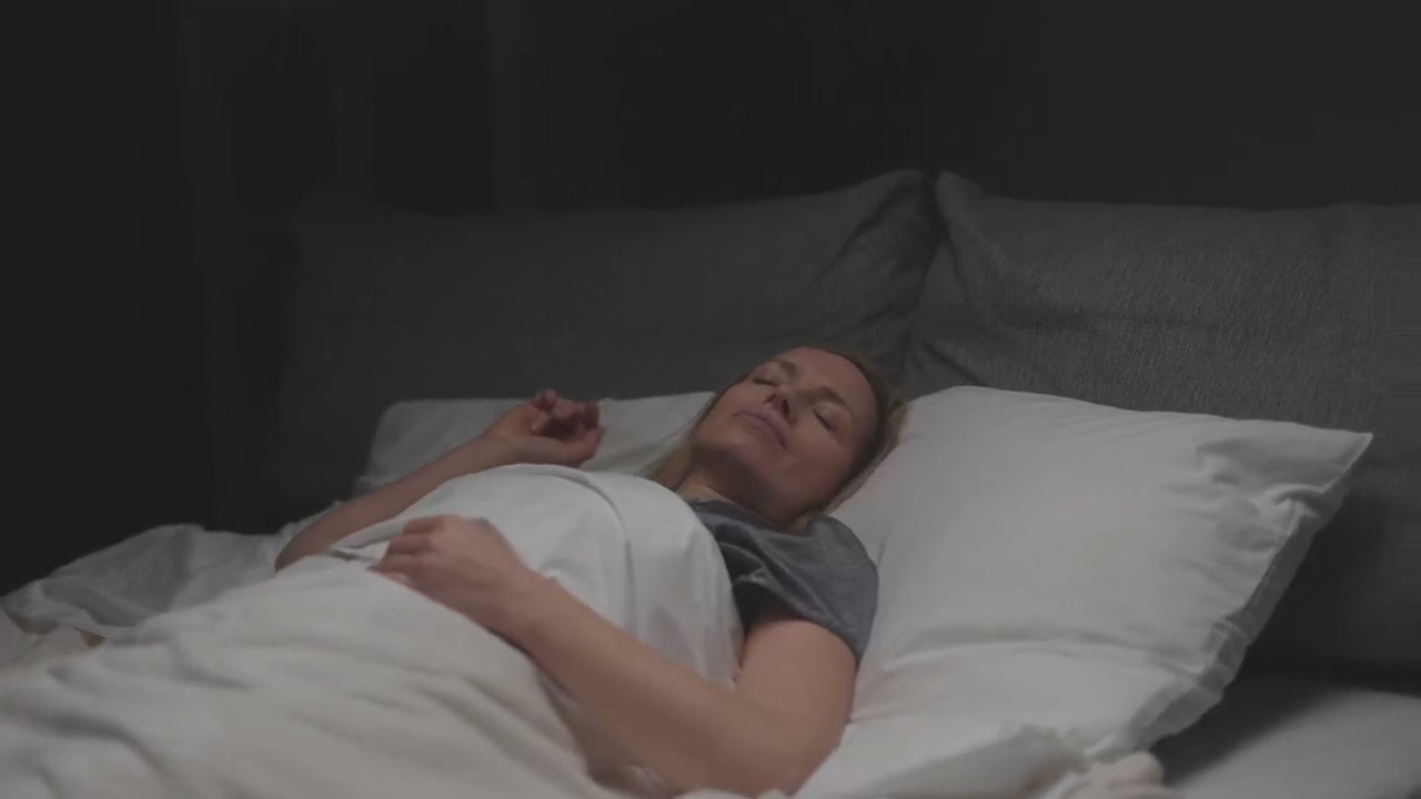 Woman sleeping peacefully stock footage