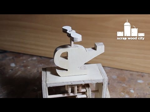 Wooden helicopter mechanical toy
