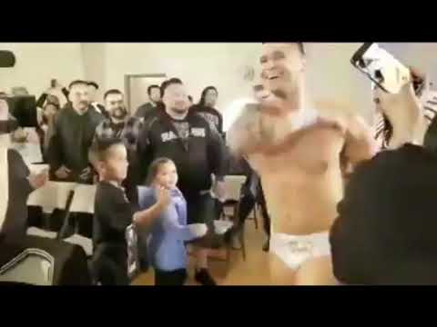 Wrestler spits at a little girl
