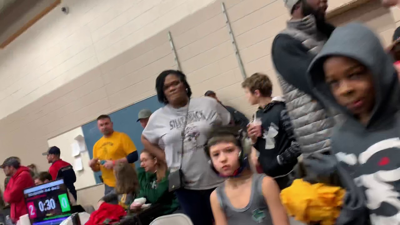Wrestling racism white mom attacks black 7yr old kid (nothing happens)